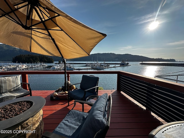 231 Main St, Seldovia, AK 99663 - deck featuring a fire pit and a water and mountain view
