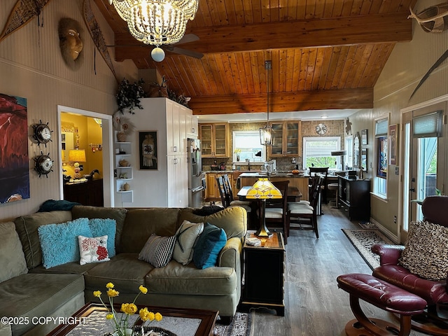 231 Main St, Seldovia, AK 99663 - living area featuring wood finished floors, a chandelier, wooden ceiling, and ceiling fan
