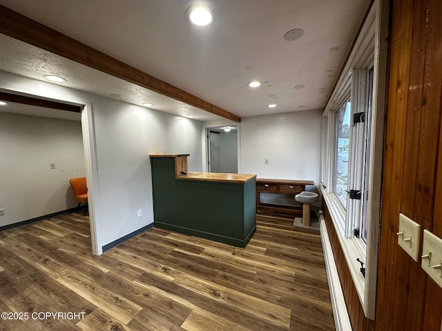 231 Main St, Seldovia, AK 99663 - kitchen featuring dark wood finished floors, a peninsula, a baseboard radiator, and recessed lighting