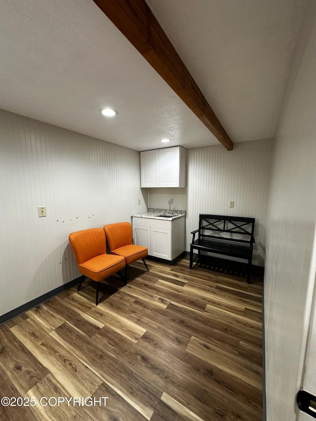 231 Main St, Seldovia, AK 99663 - living area featuring dark wood-type flooring, beamed ceiling, and recessed lighting
