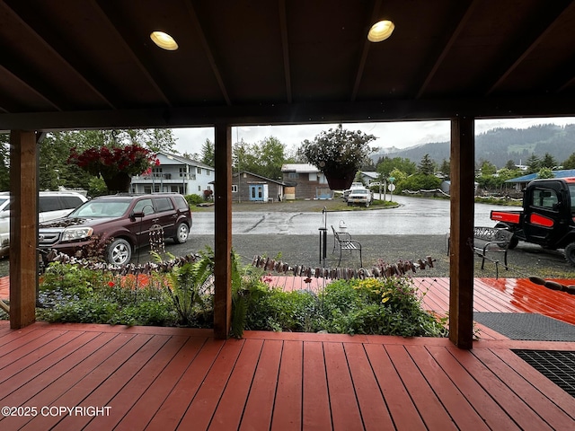 231 Main St, Seldovia, AK 99663 - wooden terrace featuring a mountain view