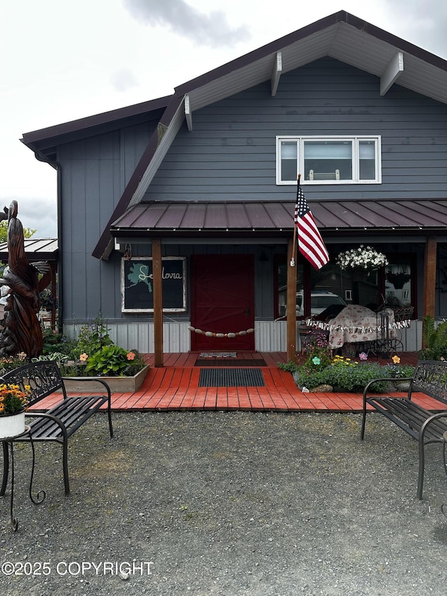 231 Main St, Seldovia, AK 99663 - view of front of home with a metal roof and covered porch