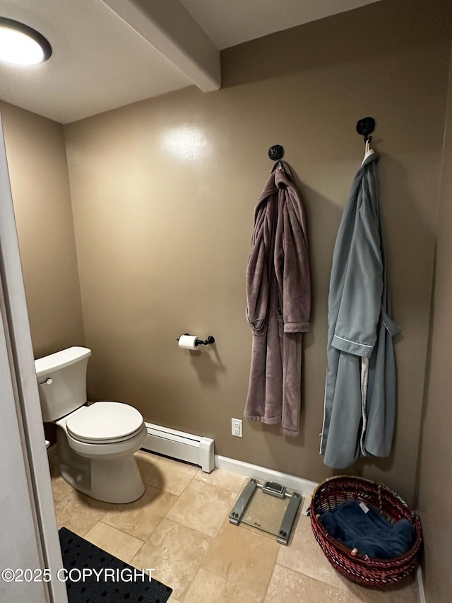 231 Main St, Seldovia, AK 99663 - bathroom with a baseboard radiator and toilet