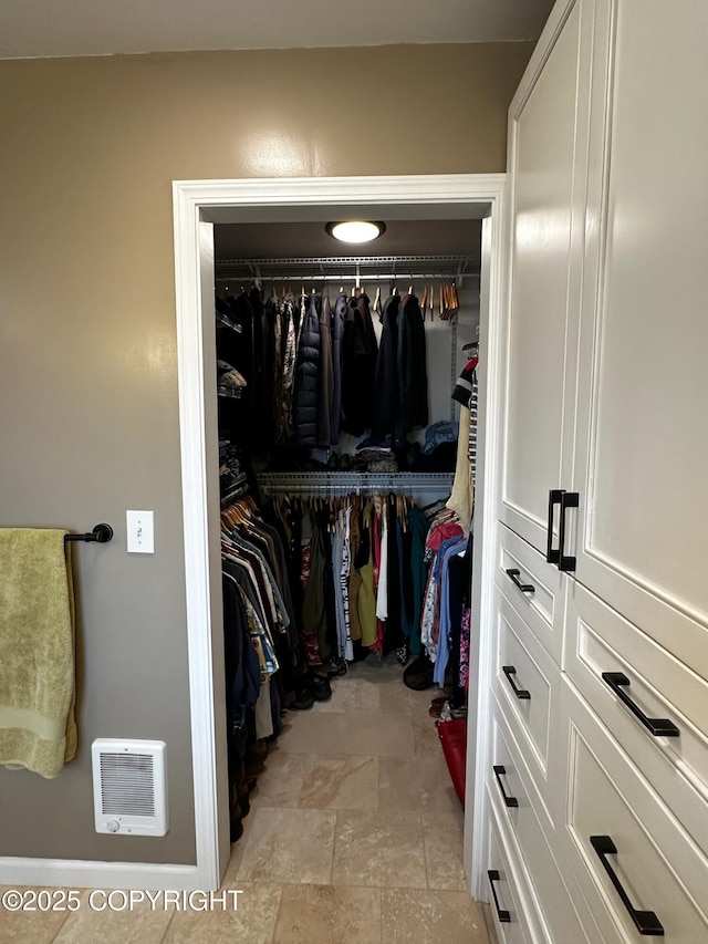 231 Main St, Seldovia, AK 99663 - walk in closet with light stone finish floors
