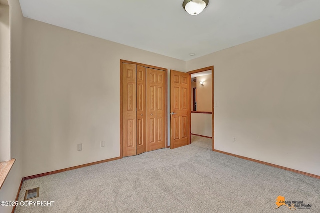 730 N Kimberly St, Wasilla, AK 99654 - unfurnished bedroom featuring carpet floors and a closet