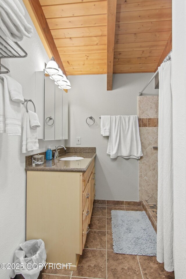47000 Lexington Ct, Kenai, AK 99611 - bathroom with wood ceiling, vanity, a shower stall, and tile patterned flooring