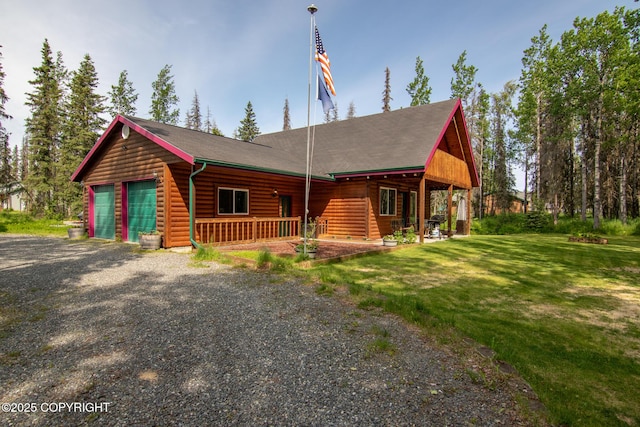 47000 Lexington Ct, Kenai, AK 99611 - view of front of home featuring log veneer siding and a front yard