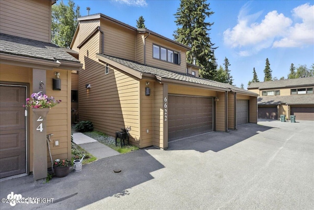 6622 Lakeway Dr, Anchorage, AK 99502 - view of home's exterior with a garage