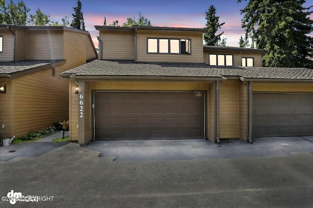 6622 Lakeway Dr, Anchorage, AK 99502 - view of front of property featuring a garage and driveway