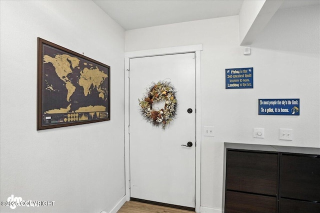 6622 Lakeway Dr, Anchorage, AK 99502 - foyer entrance featuring wood finished floors