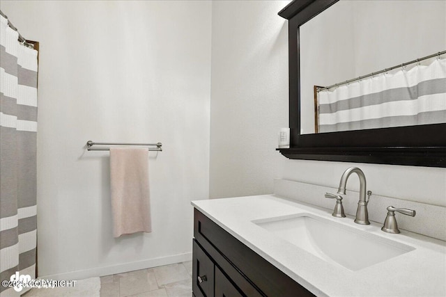 6622 Lakeway Dr, Anchorage, AK 99502 - bathroom featuring vanity and baseboards