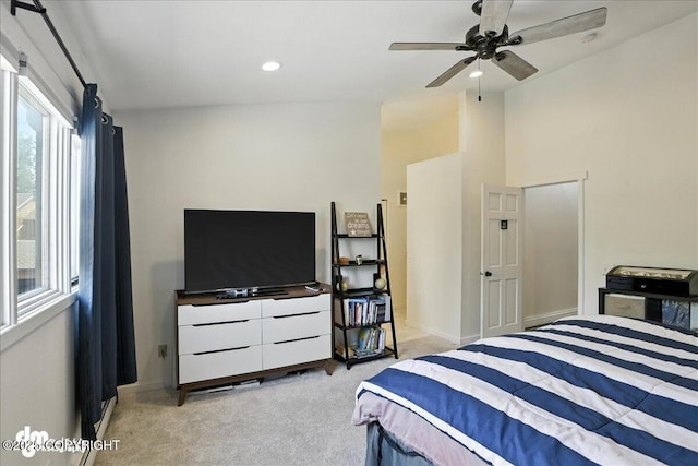 6622 Lakeway Dr, Anchorage, AK 99502 - carpeted bedroom with multiple windows, recessed lighting, and ceiling fan