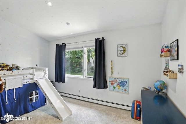 6622 Lakeway Dr, Anchorage, AK 99502 - carpeted bedroom with a baseboard heating unit
