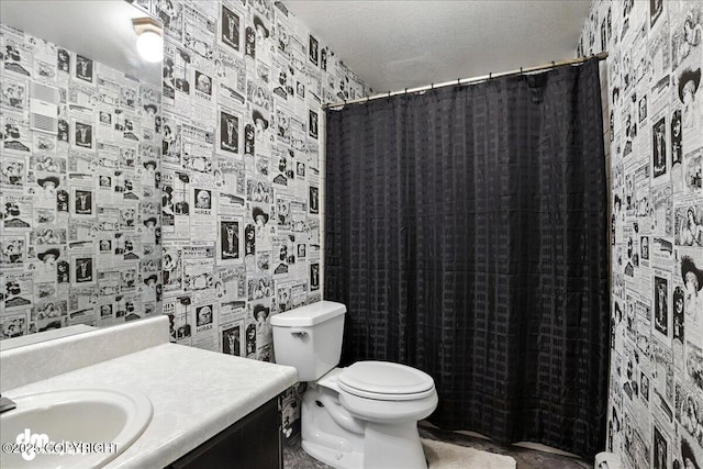 6622 Lakeway Dr, Anchorage, AK 99502 - bathroom with wallpapered walls, vanity, and a shower with curtain