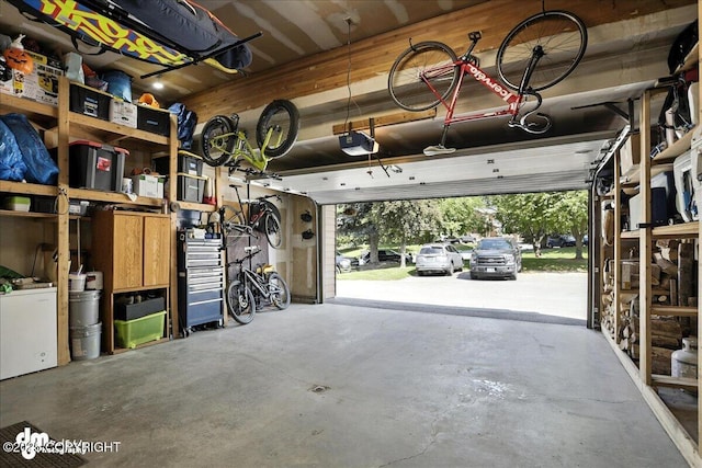 6622 Lakeway Dr, Anchorage, AK 99502 - garage featuring a garage door opener