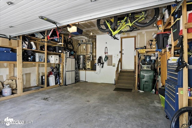 6622 Lakeway Dr, Anchorage, AK 99502 - garage featuring a garage door opener