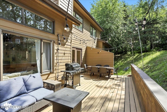 6622 Lakeway Dr, Anchorage, AK 99502 - wooden deck with outdoor dining space, grilling area, and an outdoor living space