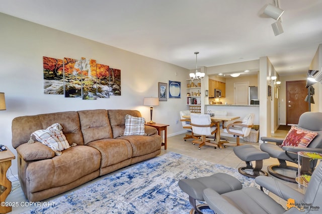 1200 I St Unit 314, Anchorage, AK 99501 - living area with a chandelier and light tile patterned flooring