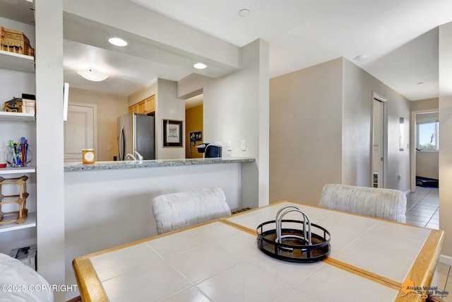 1200 I St Unit 314, Anchorage, AK 99501 - dining space with recessed lighting and tile patterned flooring