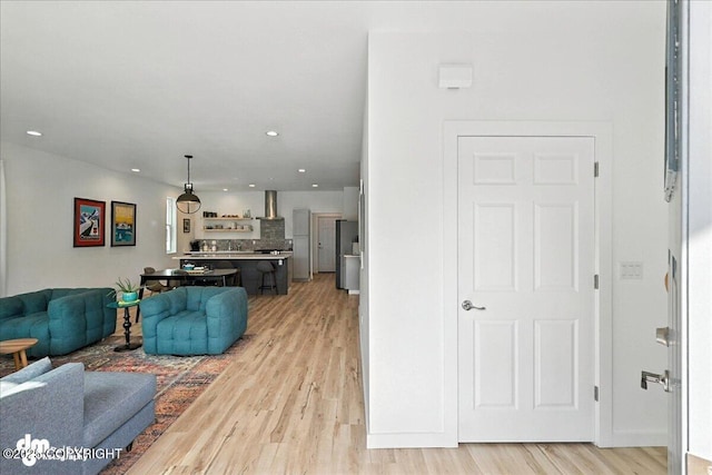 220 Susieana Ln, Kenai, AK 99611 - living room featuring light wood-type flooring and recessed lighting