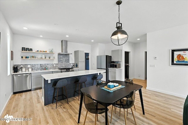 220 Susieana Ln, Kenai, AK 99611 - dining area featuring light wood-style flooring and recessed lighting
