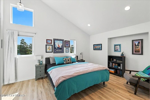 220 Susieana Ln, Kenai, AK 99611 - bedroom featuring high vaulted ceiling, light wood-type flooring, and recessed lighting