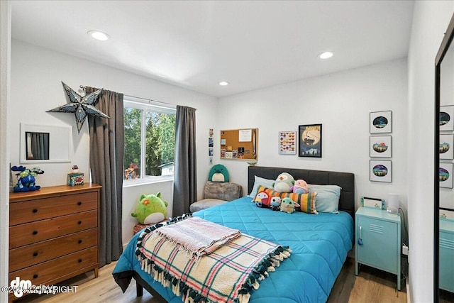 220 Susieana Ln, Kenai, AK 99611 - bedroom featuring wood finished floors and recessed lighting