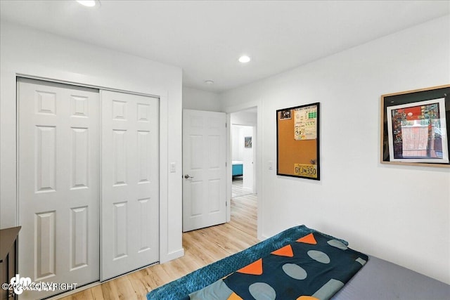 220 Susieana Ln, Kenai, AK 99611 - bedroom featuring light wood-type flooring, recessed lighting, and a closet