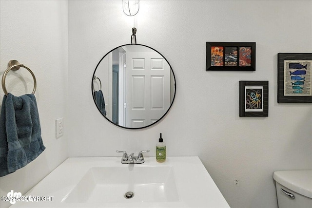 220 Susieana Ln, Kenai, AK 99611 - bathroom featuring toilet and vanity