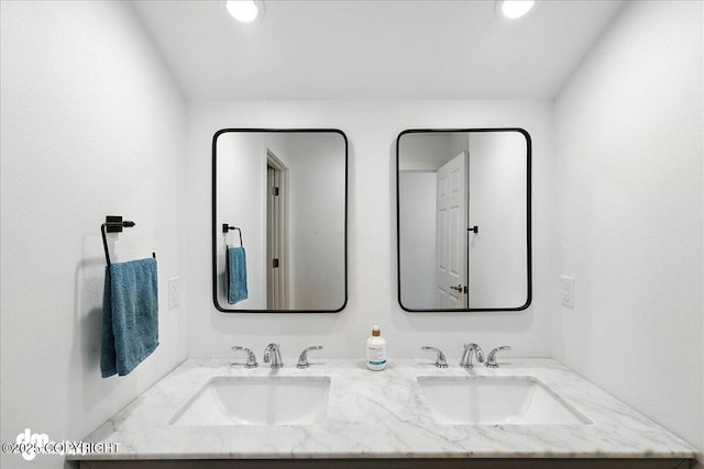 220 Susieana Ln, Kenai, AK 99611 - bathroom with double vanity and recessed lighting