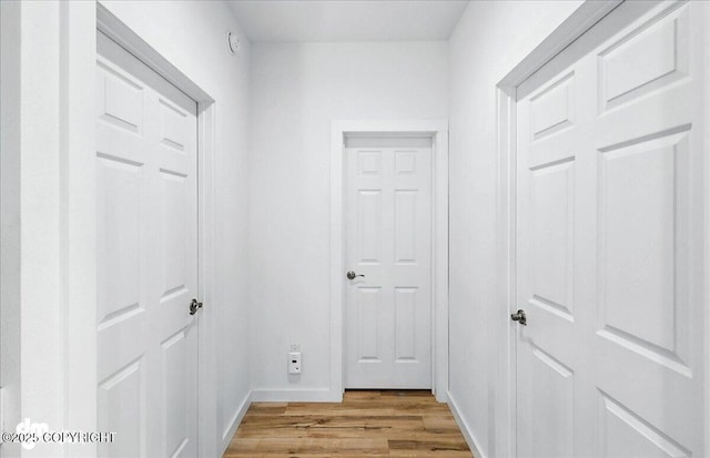 220 Susieana Ln, Kenai, AK 99611 - corridor with light wood-type flooring and baseboards