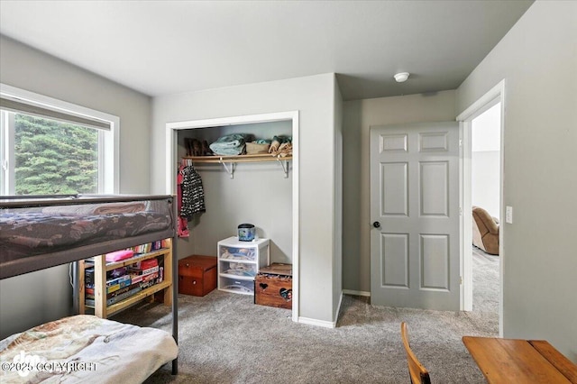 2660 N Jasper Dr, Wasilla, AK 99654 - carpeted bedroom featuring a closet and baseboards