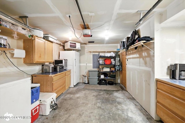 2660 N Jasper Dr, Wasilla, AK 99654 - below grade area featuring a garage and electric panel
