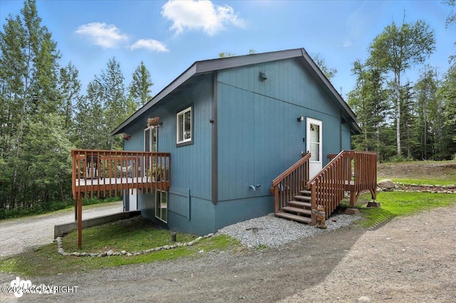 2660 N Jasper Dr, Wasilla, AK 99654 - view of property exterior with a wooden deck
