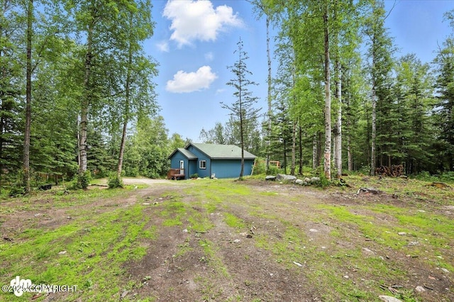 2660 N Jasper Dr, Wasilla, AK 99654 - view of yard with a forest view