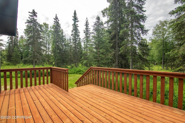 47459 Lakeside St, Nikiski/North Kenai, AK 99611 - wooden deck featuring a lawn and a forest view
