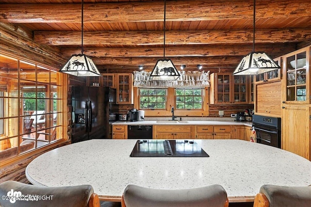 34035 Keystone Dr, Soldotna, AK 99669 - kitchen with black appliances, a wooden ceiling with exposed beams, a kitchen island, a kitchen bar, and glass insert cabinets