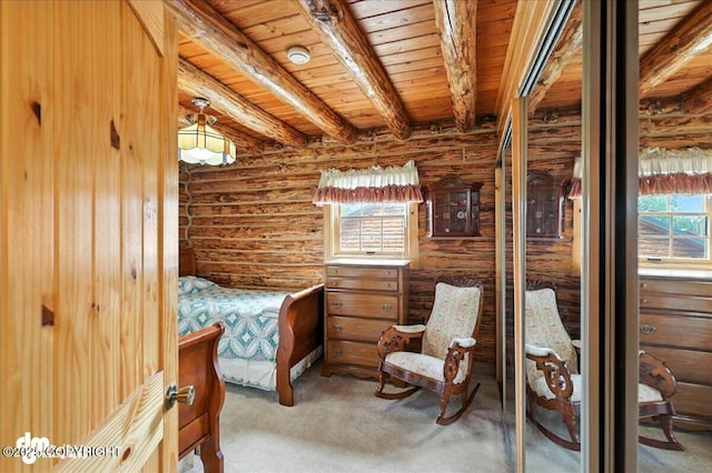 34035 Keystone Dr, Soldotna, AK 99669 - carpeted bedroom featuring a wooden ceiling with exposed beams and log walls