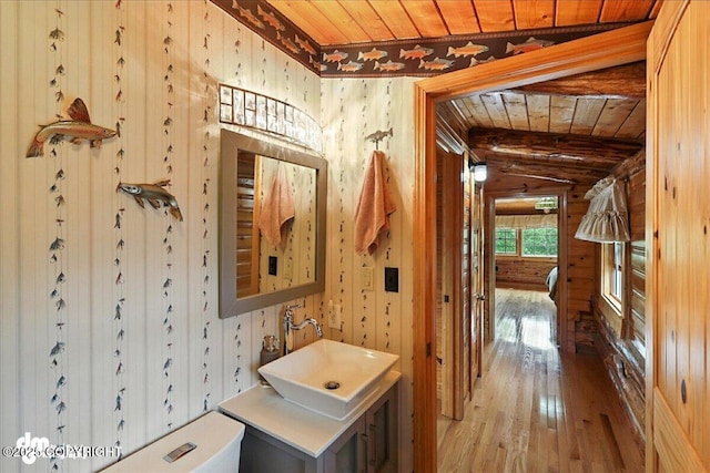 34035 Keystone Dr, Soldotna, AK 99669 - bathroom featuring wood ceiling, wood-type flooring, vanity, and vaulted ceiling