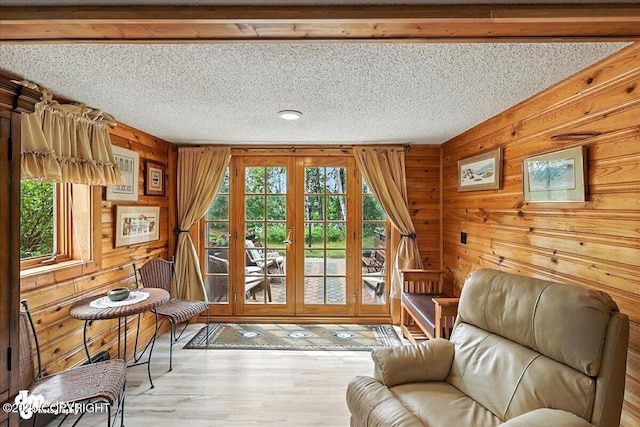 34035 Keystone Dr, Soldotna, AK 99669 - entryway with wood finished floors, wood walls, and a textured ceiling