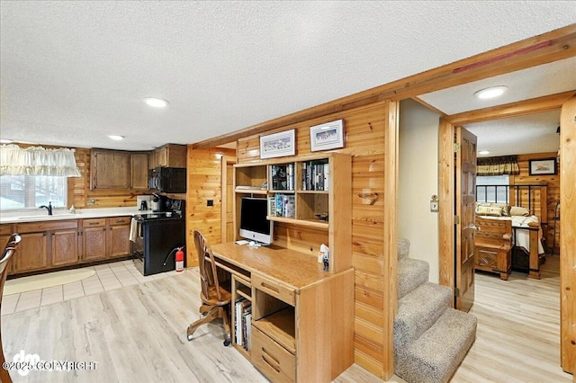 34035 Keystone Dr, Soldotna, AK 99669 - office with wooden walls, a textured ceiling, light wood-type flooring, and recessed lighting