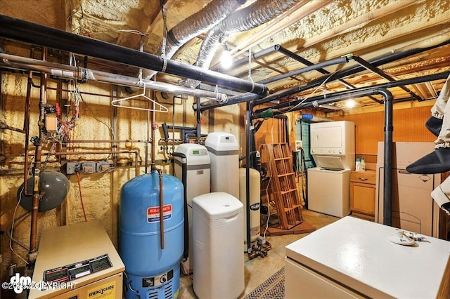34035 Keystone Dr, Soldotna, AK 99669 - utility room with stacked washer / dryer