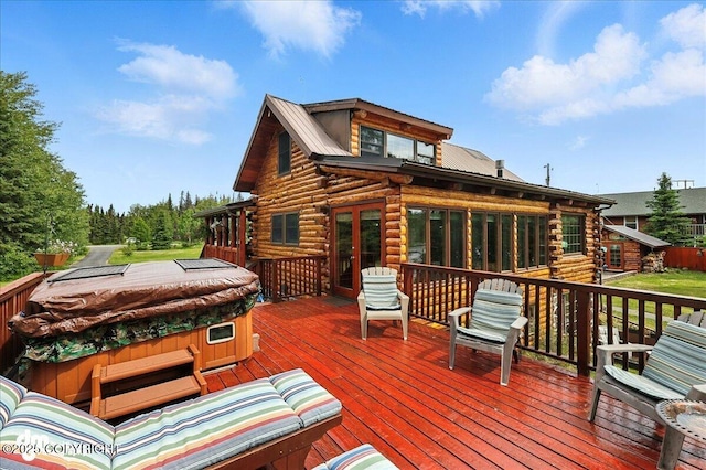 34035 Keystone Dr, Soldotna, AK 99669 - wooden deck featuring a hot tub and french doors