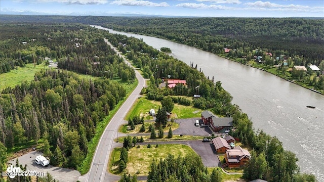 34035 Keystone Dr, Soldotna, AK 99669 - aerial view of a heavily wooded area and a nearby body of water