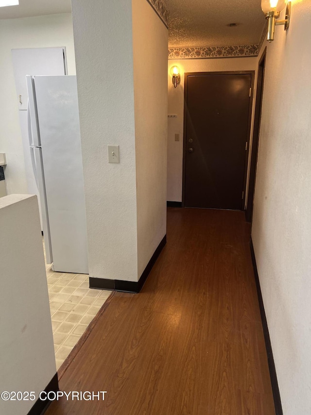 302 Sweetgale Ct # 302, Anchorage, AK 99518 - hallway with wood finished floors
