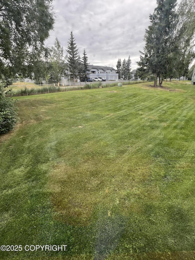 302 Sweetgale Ct # 302, Anchorage, AK 99518 - view of grassy yard