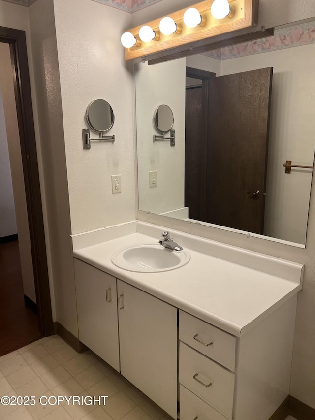 302 Sweetgale Ct # 302, Anchorage, AK 99518 - bathroom featuring vanity and baseboards
