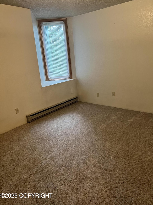 302 Sweetgale Ct # 302, Anchorage, AK 99518 - empty room with a baseboard radiator, carpet, and a textured ceiling