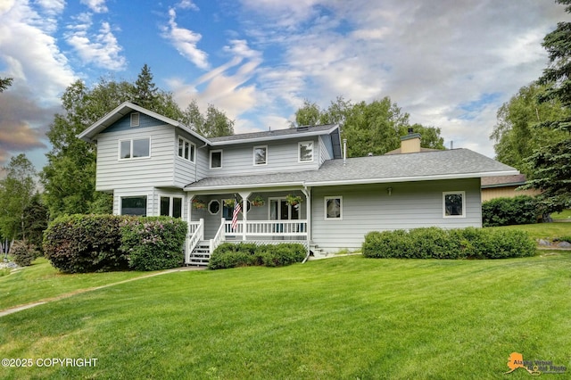 2701 Kempton Hills Dr, Anchorage, AK 99516 - view of front of property with a porch, a front yard, a chimney, and a shingled roof