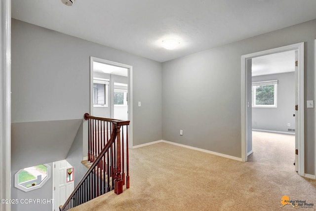 2701 Kempton Hills Dr, Anchorage, AK 99516 - hallway featuring an upstairs landing and carpet floors
